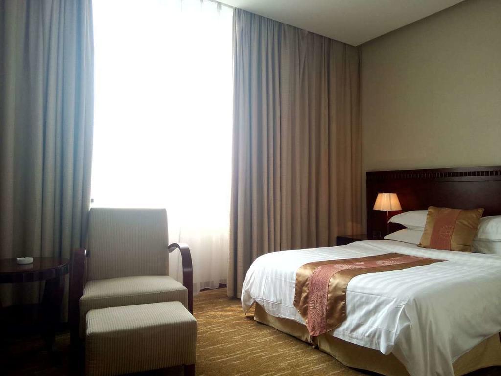 Century Hotel Taicang Habitación foto