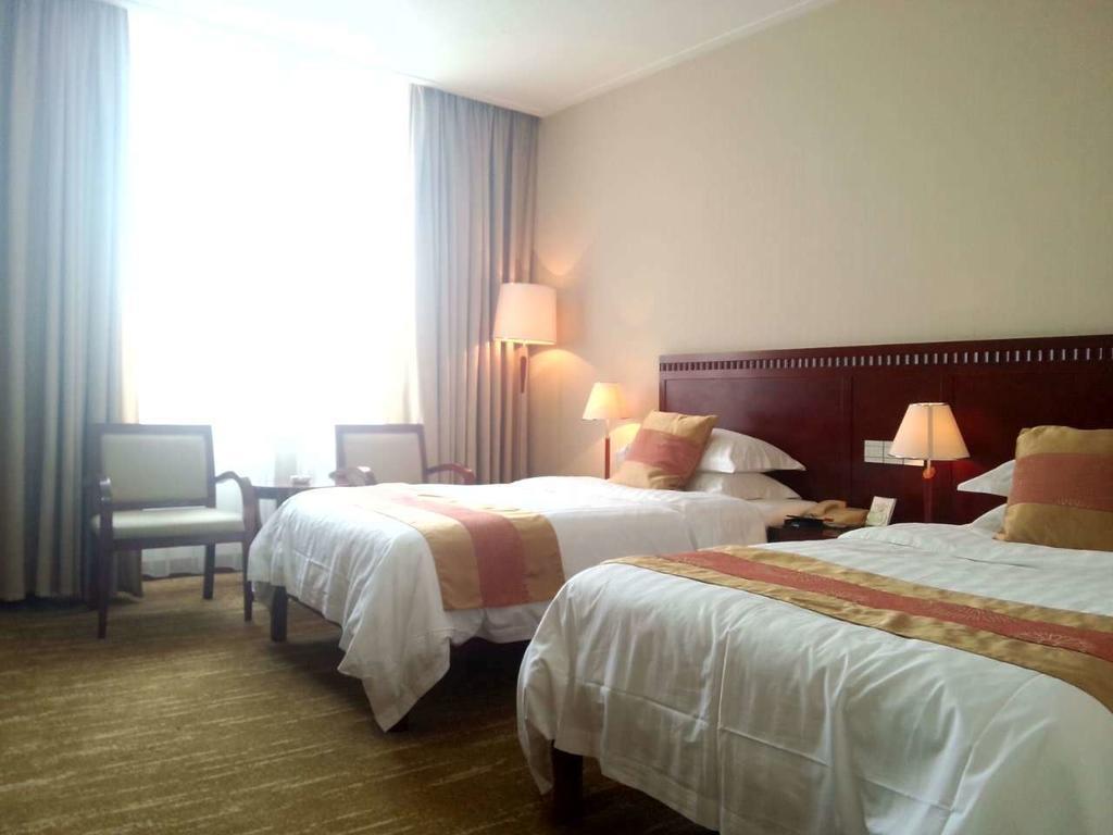 Century Hotel Taicang Habitación foto